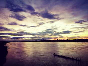 Scenic view of sea against dramatic sky