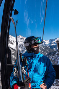 High angle view of man skiing on snowcapped mountain