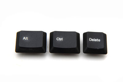 Close-up of computer keyboard against white background