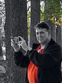 Man wearing mask in forest