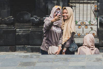 Young woman using smart phone