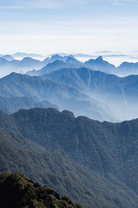 Scenic view of mountains against sky during winter