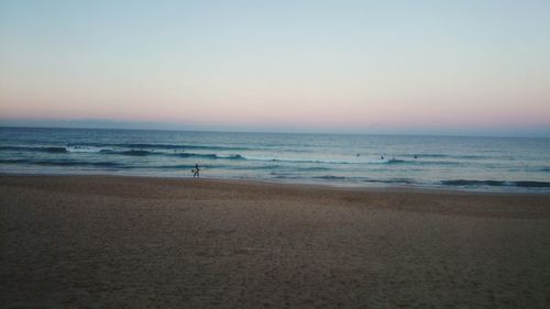 Scenic view of sea at sunset