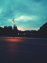 Road against cloudy sky
