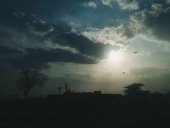 Low angle view of cloudy sky at sunset