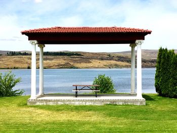 Gazebo in park against sky