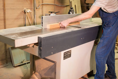 Man working on wood