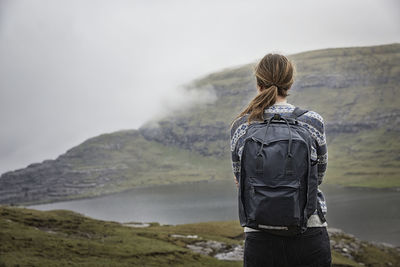 Woman looking at lake