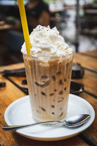 Close-up of coffee served on table