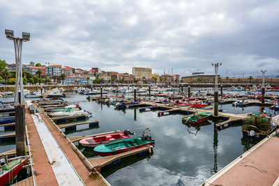 High angle view of boats moored at harbor