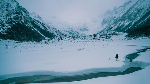 Scenic view of snowcapped mountains during winter