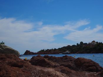 Scenic view of bay against sky