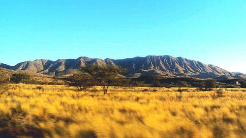 Scenic view of mountains against clear sky