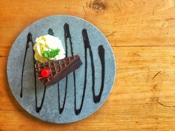 High angle view of cake in plate on table