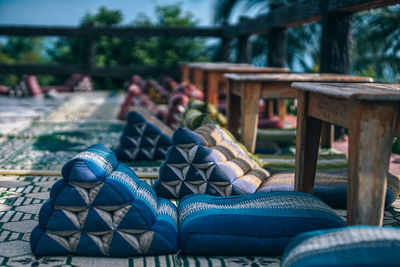 Close-up of pillows and tables