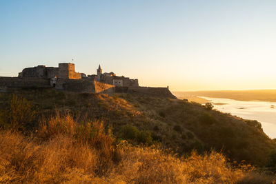 Juromenha castle and guadiana river at sunrise, in portugal