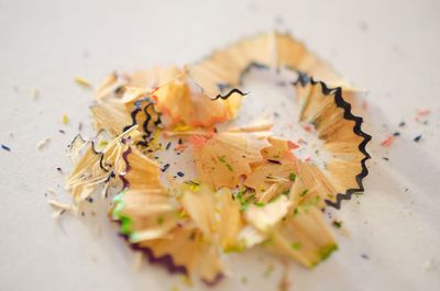 Close up of pencil shavings on table