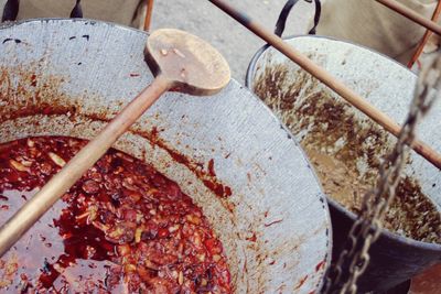 High angle close view of goulash in pan at market stall