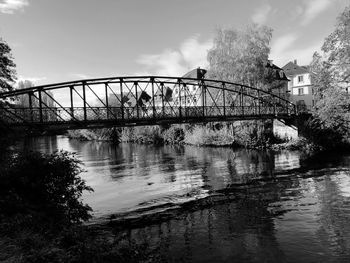 Bridge over river against sky