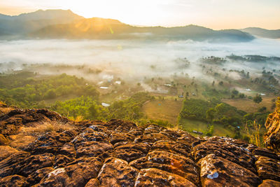 Aerial view of landscape against sky during sunset