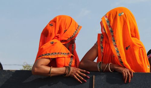 Portrait of two indian women wearing saris