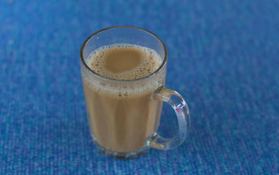 Close-up of coffee cup on table