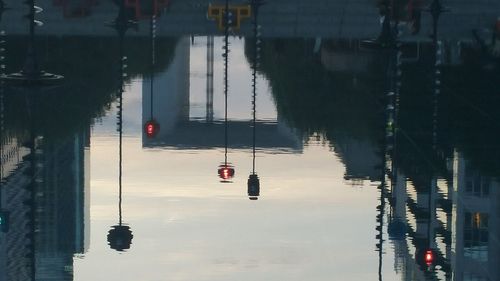 Overhead cable car over lake in city