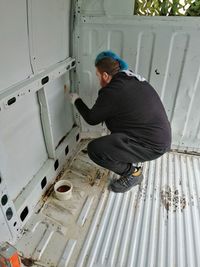 Side view of man working