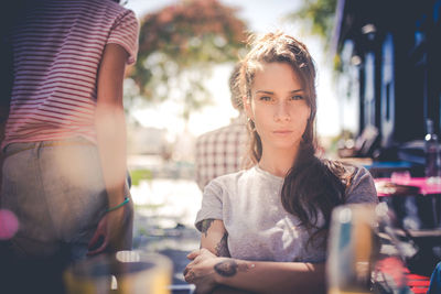 Portrait of young woman in cafe