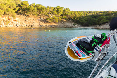 High angle view of boat in sea with wakeboard