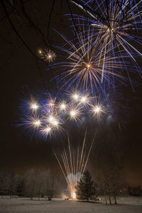 Firework display at night