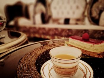 Close-up of coffee cup on table