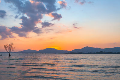 Scenic view of sea against sky during sunset