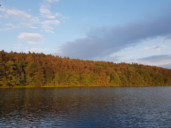 Scenic view of lake against sky during autumn