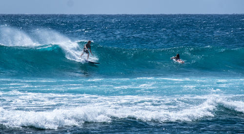 Man surfing in sea