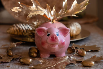 Close-up of piggy bank on table