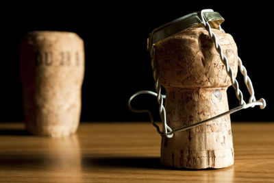 Close-up of beer bottles on table