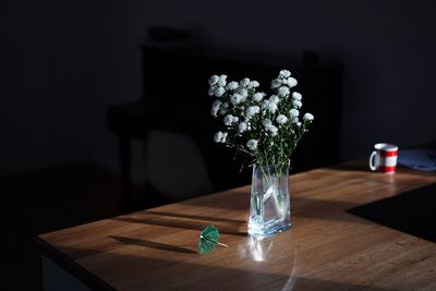 Flowers in vase on table at home