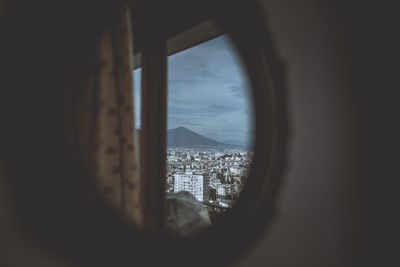 View of sea seen through window