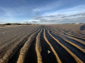 Scenic view of desert against sky