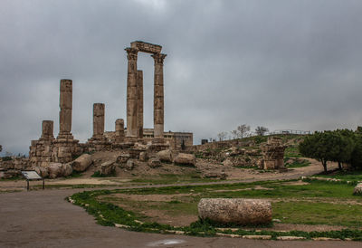 Old ruin building against cloudy sky