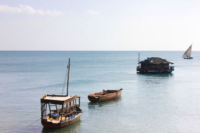 Ship in sea against clear sky