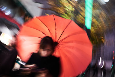 Blurred motion of person in rain