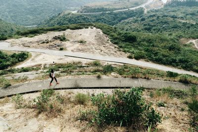 Full length of person on landscape against sky