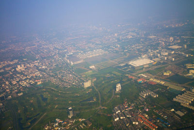 High angle view of buildings against sky in city