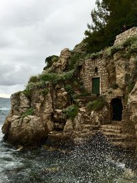 View of rocks by river