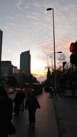 People walking on street in city