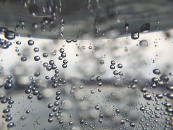 Close-up of water drops on glass