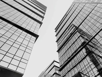 Low angle view of modern buildings against clear sky