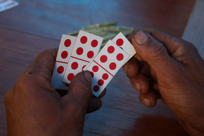 Close-up of man holding hands